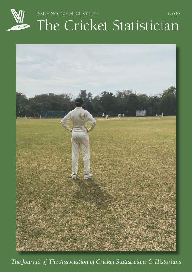 2024 August Journal 207 Cover photo shows a fielder in the deep, hands on hips, with the umpire, bowler batters and keepers appearing as tiny figures in the distance; trees and a tall building visible in the distance